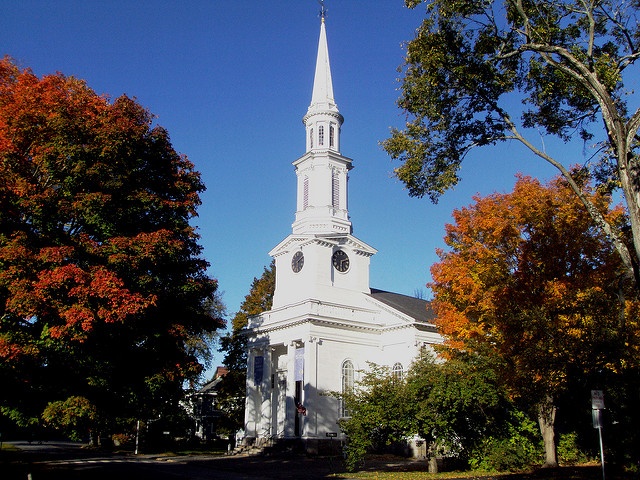 Autumn leaves and Puritan church on Lexington Green Mass. from Flickr via Wylio
